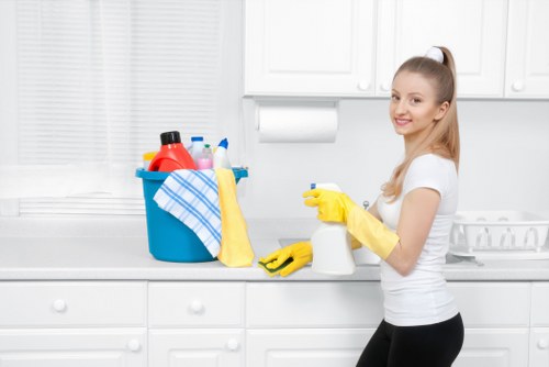 Staff using approved cleaning products and protective measures